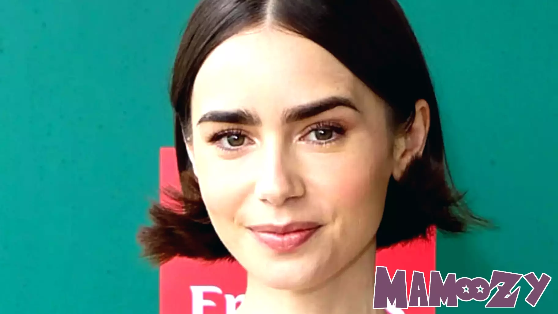 Lily Collins Takes a Stylish Break at Wimbledon